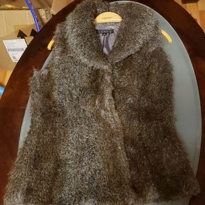 A woman's sleeveless coat